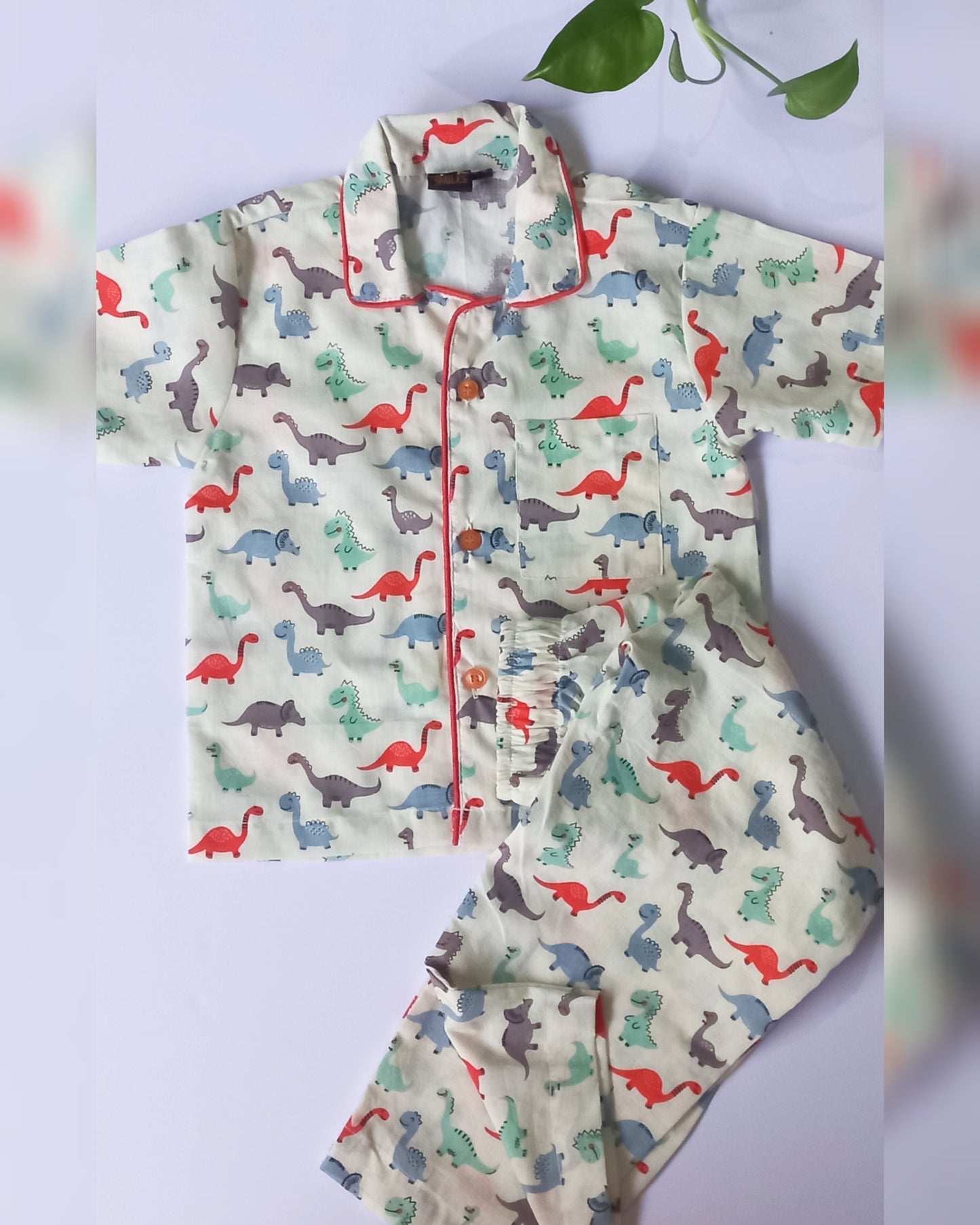 Hand Block Printed Pyjama Top Set • Regular collar / front open / short sleeves top with front pocket • Elasticated waist • Fabric: Cotton • Colour: Off White with Brown and Green • Wash care: Handwash/ Mild Machinewash